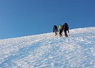 20150524 055331  Heading up the snow bank. Lisa and Darrin on short-rope.