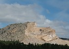 DSC 1757  Crazy Horse Memorial in South Dakota. To get an idea of the size: there is a car parked at the end of the flat bit in front of the face - the car is the smaller of the 2 things there.